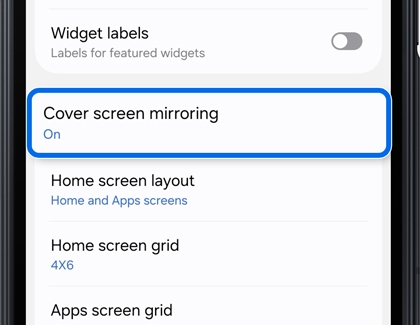 Home screen settings on a Galaxy Z TriFold with Cover screen mirroring highlighted in a blue box.