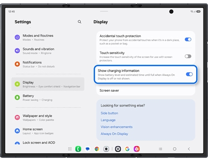 Display settings on the Galaxy Z TriFold with the Show charging information switch highlighted in a blue box.