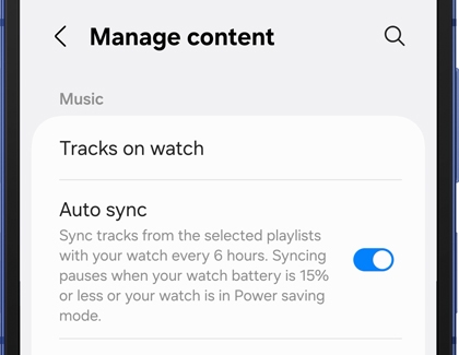 Manage content settings showing music auto sync enabled for syncing tracks to the watch every 6 hours.