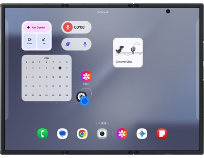 A Galaxy Z TriFold showing the home screen editing mode with a blue circle on a settings app icon being dragged to a new position.