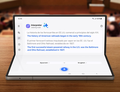 Galaxy Z Fold6 in Flex mode while displaying the Interpreter app, translating from Spanish to English