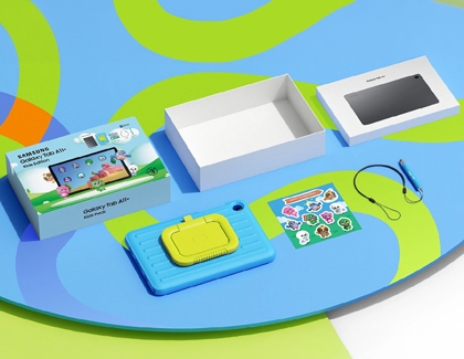 The contents of a Galaxy Tab A11 Plus Kids Edition box including the tablet, a blue cover, a stylus, and stickers.