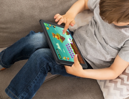 Kid playing a game on a A8