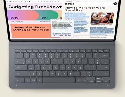 A Galaxy Tab S11 Ultra with a slim book cover keyboard, showing multiple apps in split screen.