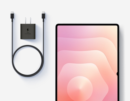 A Galaxy Tab S11 Ultra alongside a charging adapter and USB-C cable.