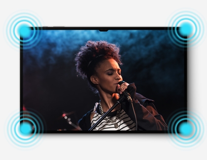 A Galaxy Tab S9 playing music from its four speakers, along with a woman singing on the screen