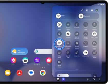 A Galaxy tablet quick settings panel showing the Wired DeX icon highlighted by a blue circle.