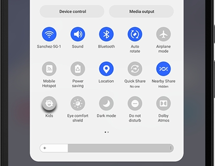 Kids icon highlighted on the Quick settings panel