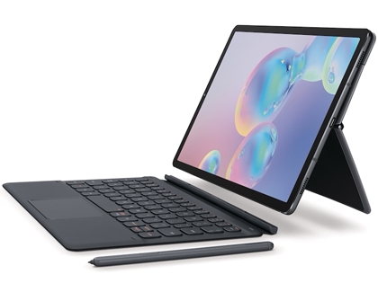 A Galaxy Tab S6 being placed on the keyboard attachment