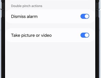 Double pinch actions with Dismiss alarm and Take picture or video switches enabled