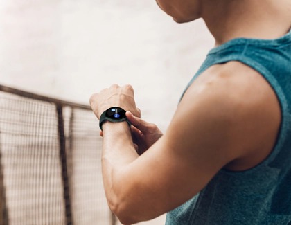 Guy wearing Galaxy Watch4 booting for the first time