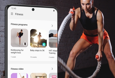 Girl working out with ropes with Samsung Health app open