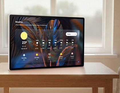 Close-up of a hand touching a photo on the MovingStyle screen to apply a dynamic filter.