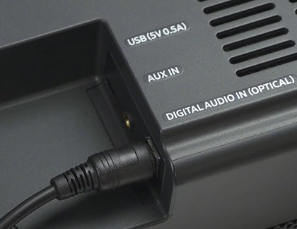 An optical cable inserted in the Digital Audio In (Optical) on a soundbar