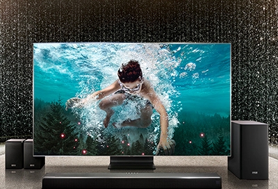 Samsung TV with surround sound speakers