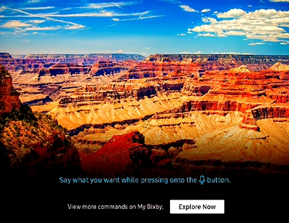 Grand Canyon displayed on the TV with Explore Now option at the bottom of the screen