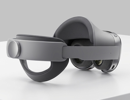 The Galaxy XR headset resting on a table with the rear fit dial and headband visible.