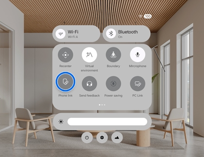 The Galaxy XR quick panel with the Phone link option highlighted.