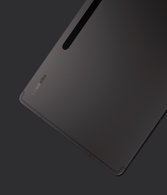 Galaxy Tab S8+ in Graphite finish from the back and slightly from the side to show the slim design.
