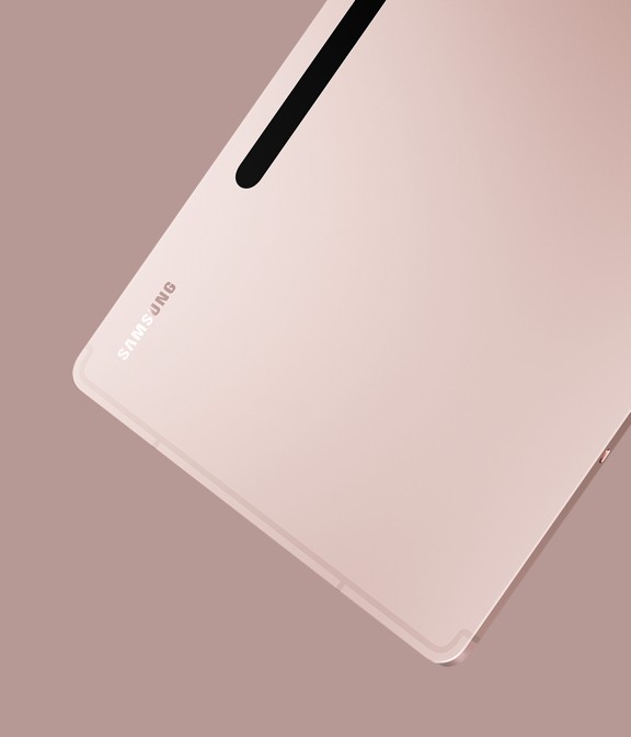 Galaxy Tab S8+ in Pink Gold finish from the back and slightly from the side to show the slim design.