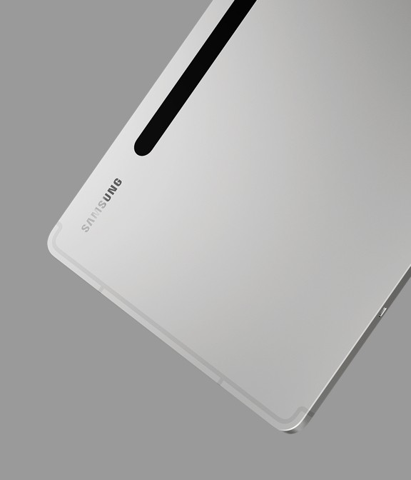 Galaxy Tab S8 in Silver finish from the back and slightly from the side to show the slim design.