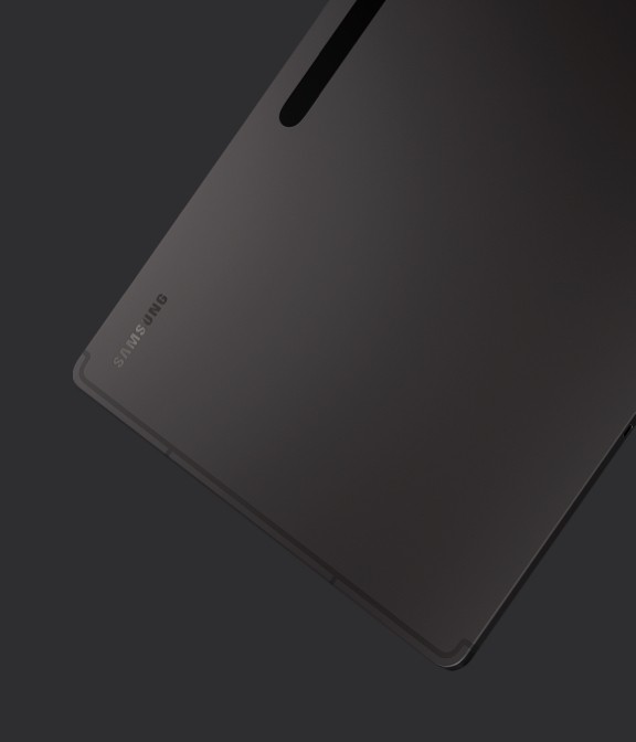 Galaxy Tab S8 Ultra in Graphite finish from the back and slightly from the side to show the slim design.