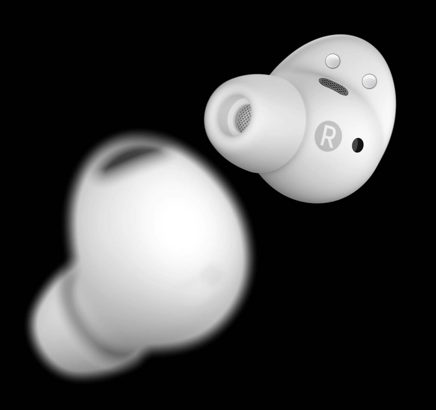 Two white Galaxy Buds2 Pro earbuds paced one in front of the other using a short depth of field. …