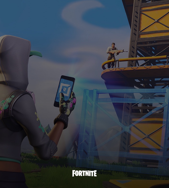 Scene of a female Fortnite character holding a phone up that’s projecting blue waves towards a car that is exploding off of a road.