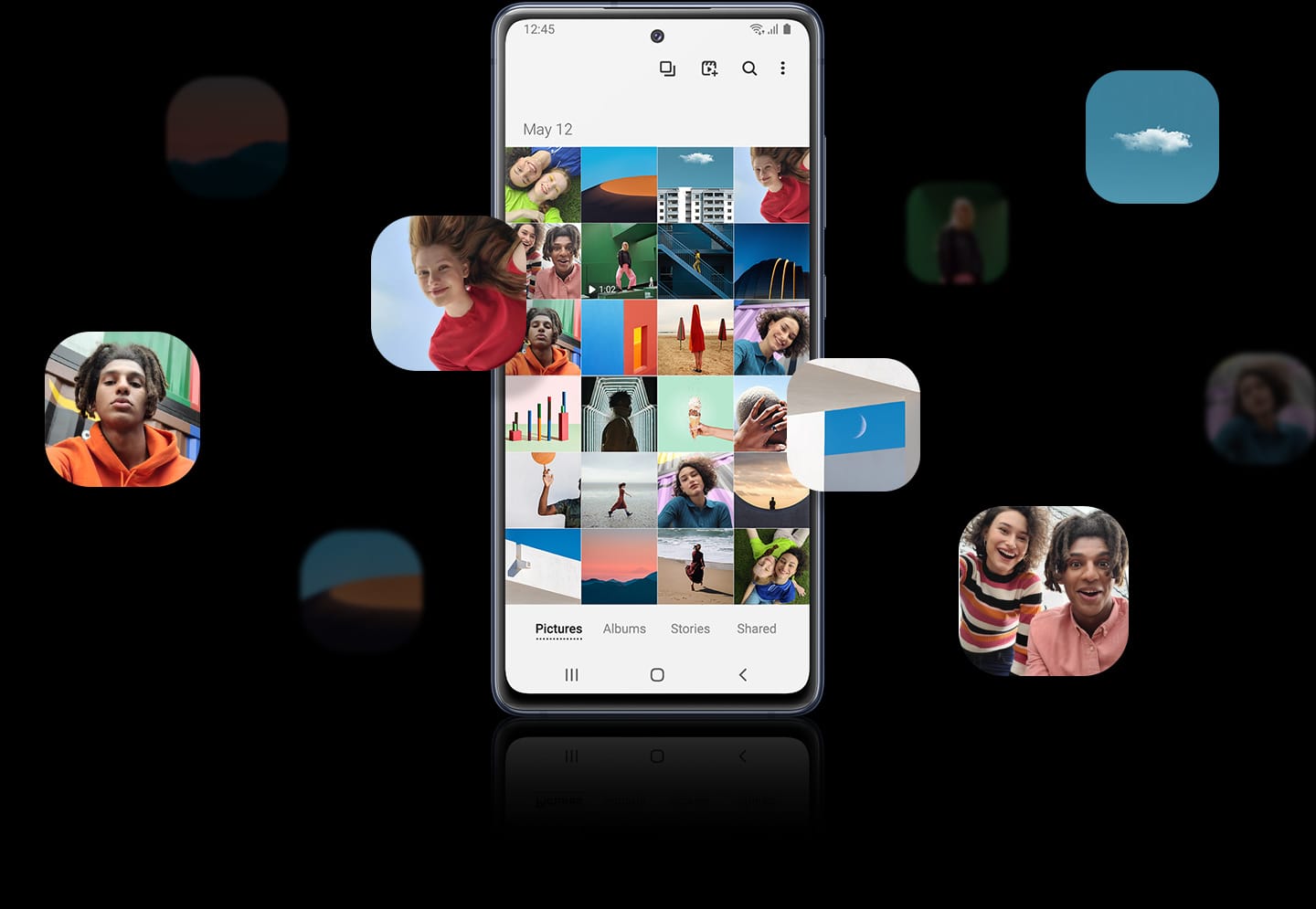 Galaxy S20 FE 5G seen from the front with the Gallery app onscreen. Surrounding the phone are thumbnails of photos taken with Galaxy S20 FE 5G to show how many photos and videos can be saved on the over 1TB storage.