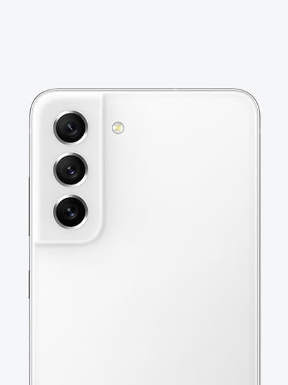 Galaxy S21 FE 5G in White seen up-close from the rear, focused on its rear camera.