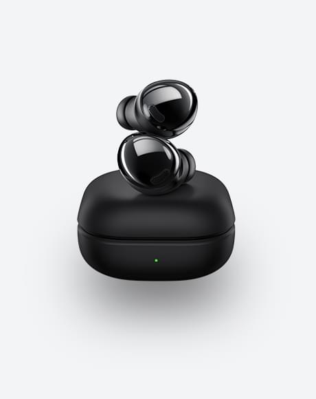 Galaxy Buds Pro earbuds in Phantom Black on top of a closed case seen from the front.