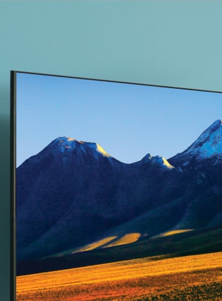 Crystal UHD in a bright living room with mountains on the screen