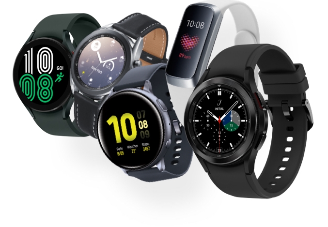 Five Galaxy Watch4 ic devices are placed side-by-side to show different colored watch bodies and bands. The watch bodies vary in color from pink gold, silver, and black, and are mixed with different colored bands.
