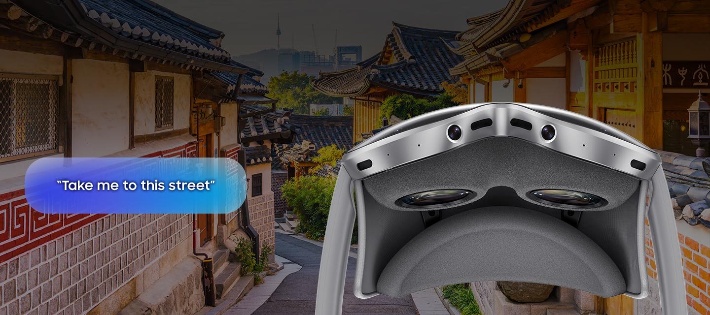 Galaxy XR seen from below, showing the bottom part of the Visor window. In the background is a traditional Korean street with a dialogue box displaying the command "Take me to this street."